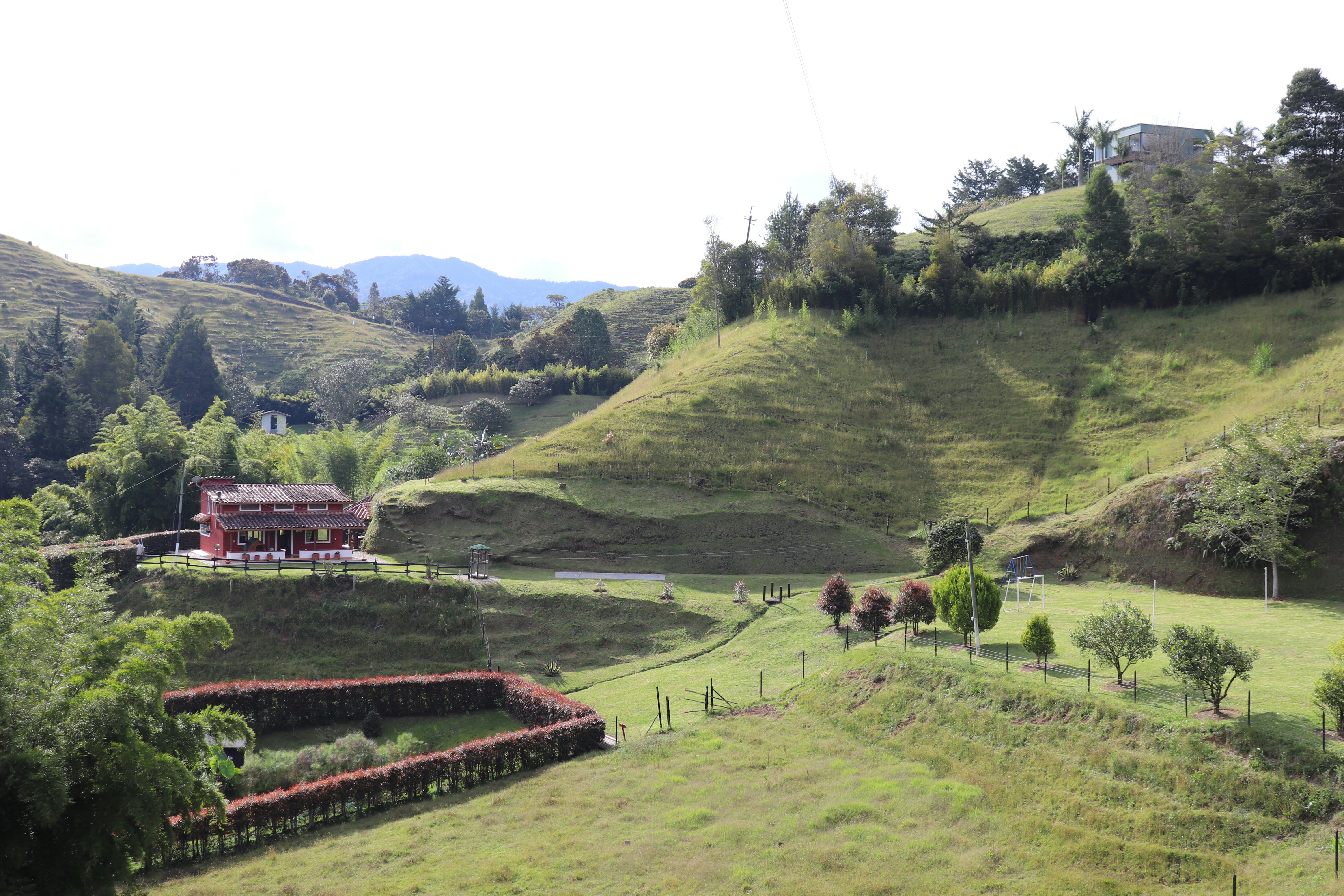 Colombian finca nestled in green hillside